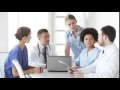 Group Of Doctors With Laptop Meeting At Hospital 4kz5dWyB