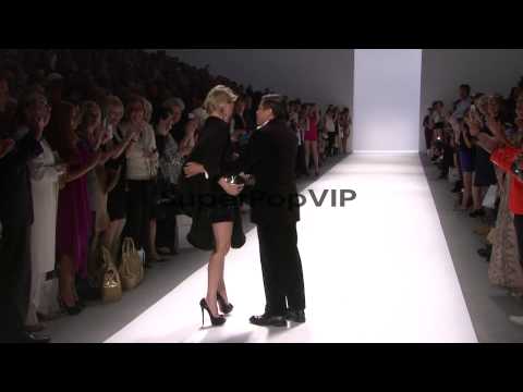 Julie Macklowe and Zang Toi walk the runway at Zang Toi -...