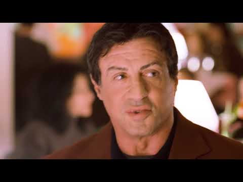 Rocky Balboa (2006) trailer frame: aging Rocky in a dim gym lacing up old gloves