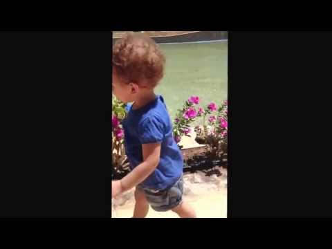 Farida enjoying the nice smell of flowers!