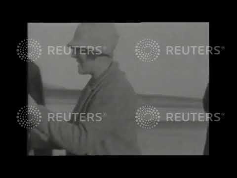 1928 WALES: Capt. Malcolm Campbell celebrates breaking the land speed record