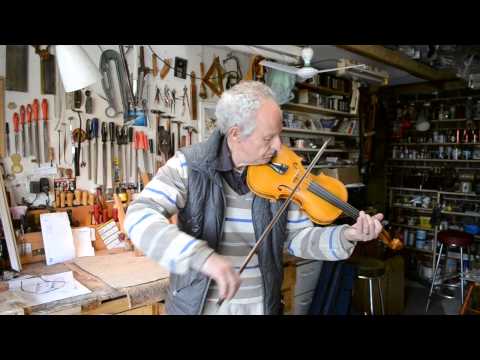 Roger Buckmaster plays his violin