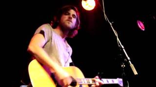 Graham Colton singing Love Comes Back Around