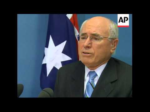 Father of Guantanamo detainee confronts PM Howard over charge