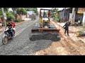 the new project of recovery road.. skill operators used bulldozers to push spread gravel.