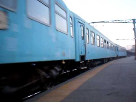 P 8123 plecand din Gara de Nord tractat de o locomotiva GM