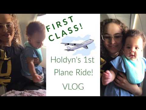 WE FLEW FIRST CLASS??? | HOLDYN'S FIRST AIRPLANE RIDE! | Baby's first flight | VLOG
