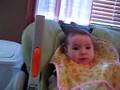 Lily Eating First Food