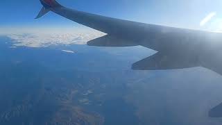Southwest Airlines WN2810 (N8541W) 737-8H4 flying over the abyss of the mountains