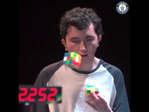 Solving Three Cubes Whilst Juggling - Guinness World Records