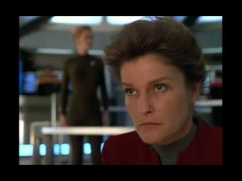 Janeway fighting back against hostile aliens