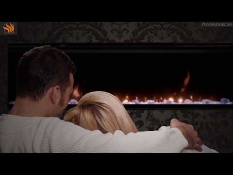 Couple Makes Passionate Love By The Fireplace