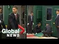 Kim Jong Un's staff struggles to line train up with red carpet