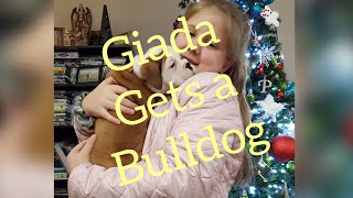 Giada gets surprised with bulldog puppy.