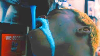 merlyn wood vomits blue liquid into a slurpee dispenser then collapses and dies