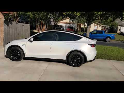 Tesla model Y wrapped in 3M 2080 satin flip ghost pearl vinyl walk around.