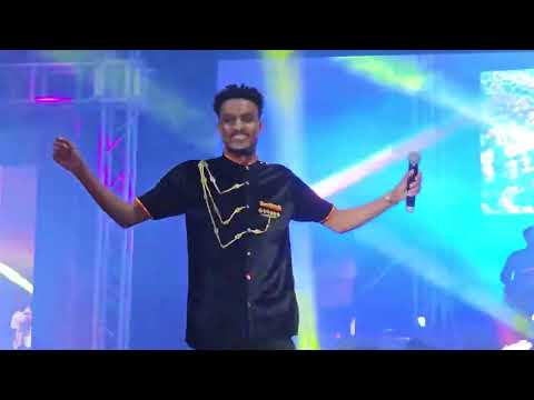 Mulugeta Maluda ድምፃዊ ማሉዳ ትግራይ ዓዲ ተጋዳላይ ህዝቢ ብሓደ ድምፂ ዝዘመረሉ መድረክ ኣሸንዳ ኣብ አዲስ አበባ ሚሊንየም አደራሽ