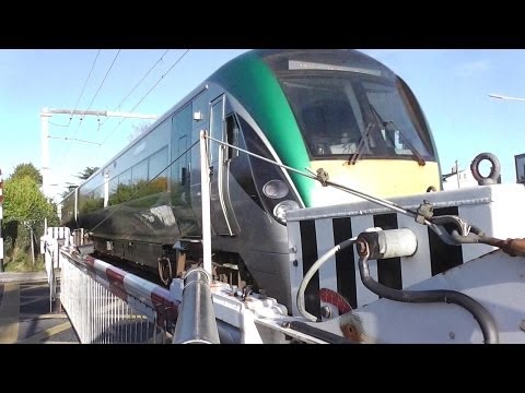 Level Crossing at Merrion Gates - 8300 and 22000 Class Trains