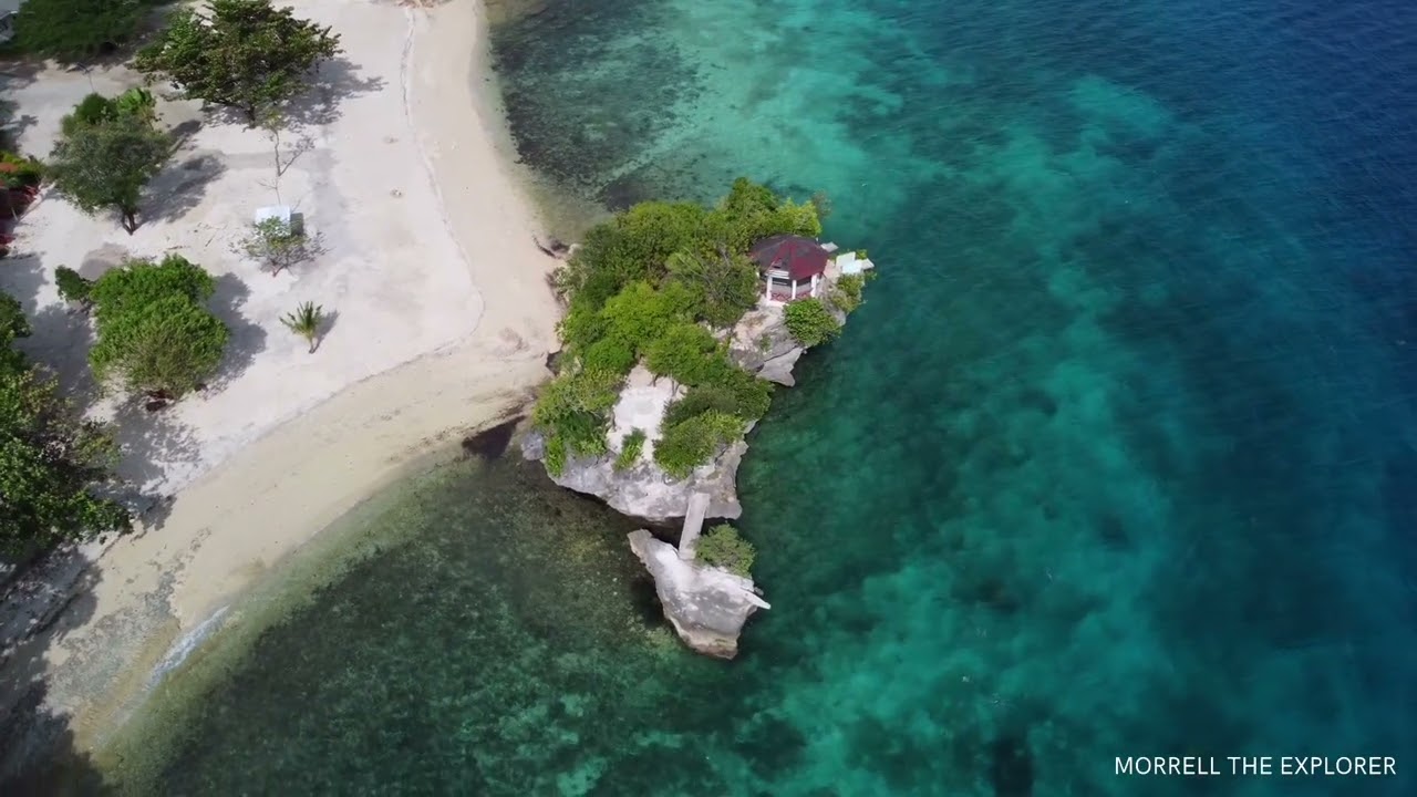 Dive into the breathtaking aerial vistas of Salagdoong Beach.