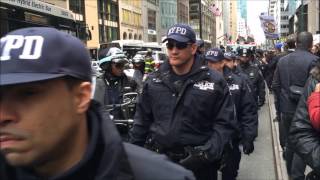 NYPD ESCORTING & MANAGING A ANTI-TRUMP PROTEST MARCH IN MIDTOWN, MANHATTAN, NEW YORK CITY.