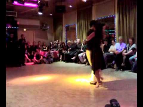  Carlos Espinoza  and  Mamié Sancy  are  dancing  to  the  tango  "  Esta Noche De Luna  "