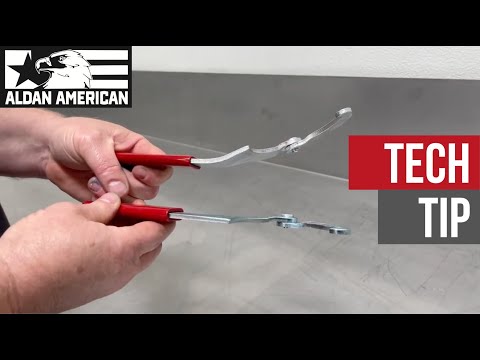 Tech Tip: Using an adjustable spanner wrench to adjust coilovers