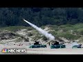 Taiwan's army hold live fire drills on island's south coast