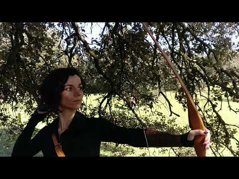 Angela shoots her standard 25# Slick Stick with wooden arrows