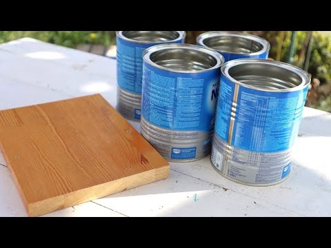 I taught all the gardeners to use tin cans in a new way. Now no one throws them away.