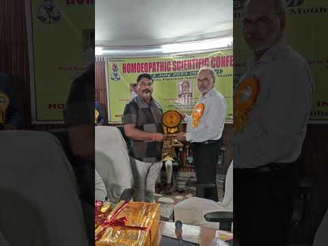 Dr Ram Prakash is awarded by Dr Shashikant Tiwari Director ,National Institute of Homeopathy Kolkata