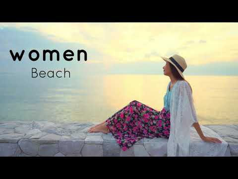 Women happy smile on the beach sea Free 4k Video