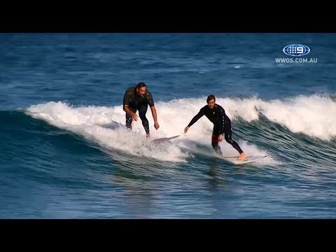 Johns and Sutton hit the surf