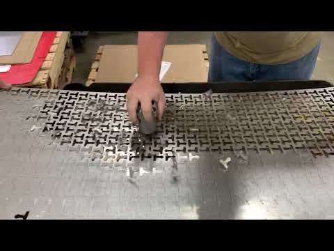 Rhino Hammer removing Stainless parts from laser cut skeleton