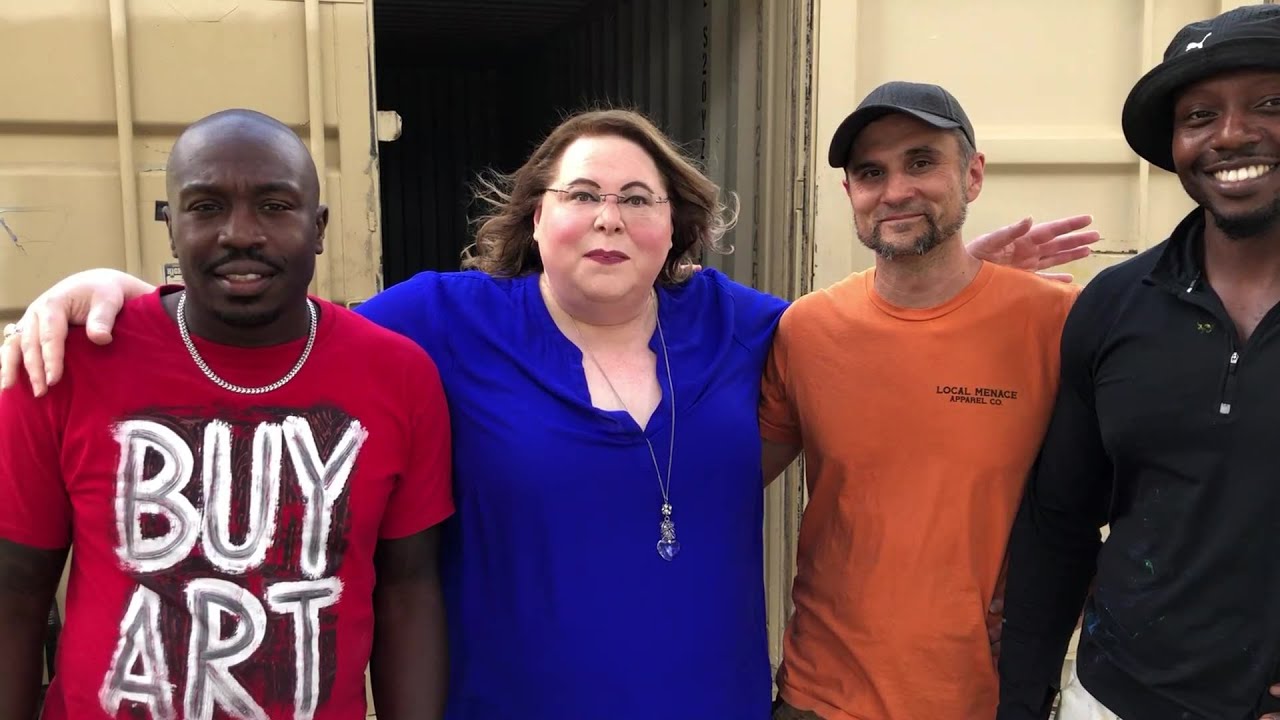 Lynn visits with the Marshall street underpass artists