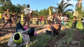 This is Wrestling for fun in the village