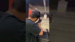 Big guns for big boys shooting a assault rifle