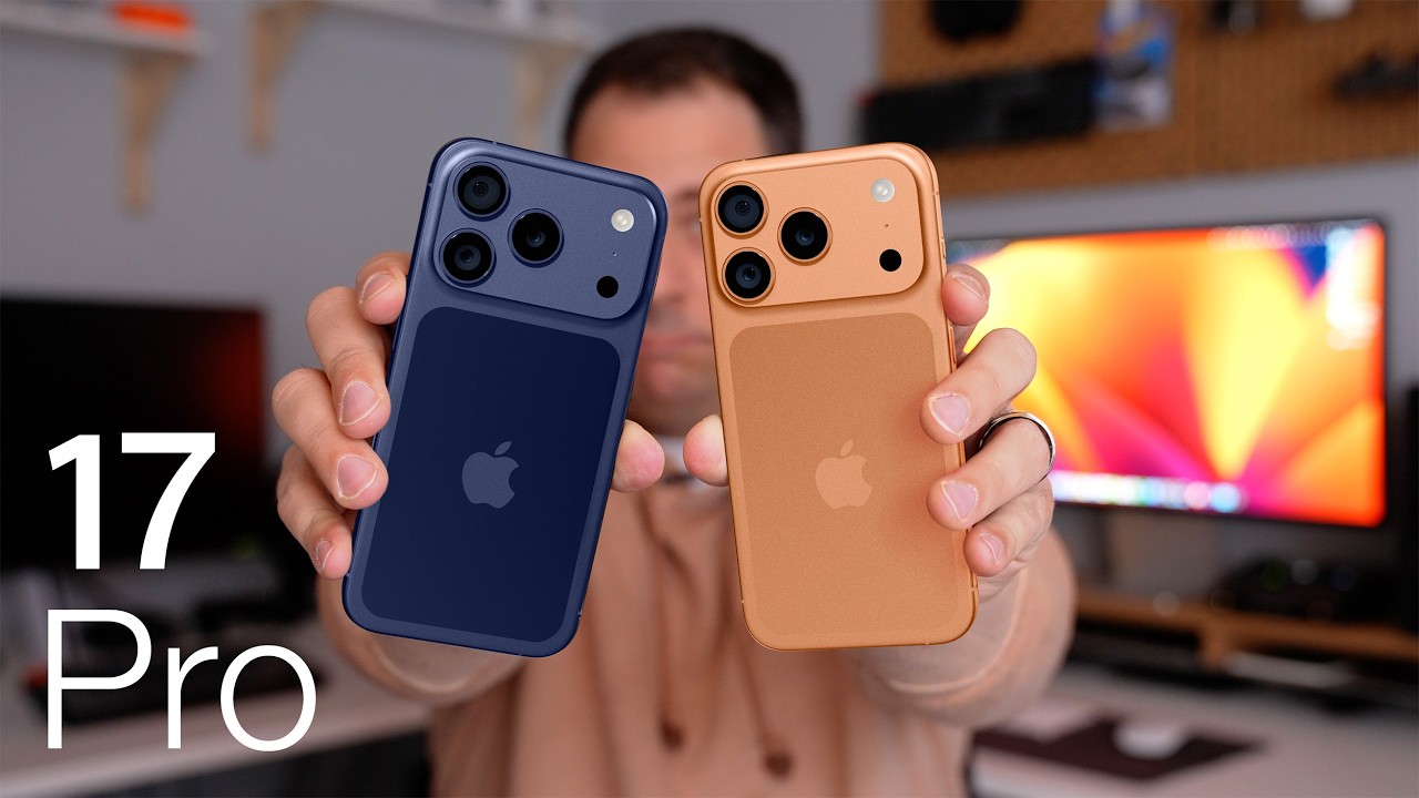 Two iPhone 17 models in dark blue and orange colors showcasing the latest design and camera setup