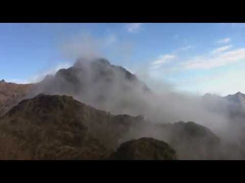 HELICOPTER FLIGHT OVER MT WILHELM PNG an