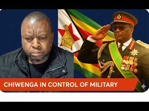 Zimbabwean soldiers standing guard near armored vehicles in Harare