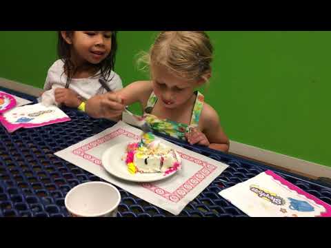Enjoying her unicorn cake
