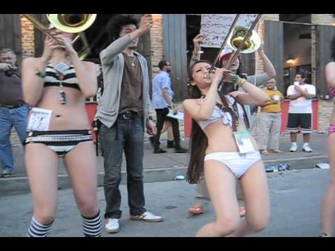 Japanese girls playing trumpet in bikini at SXSW