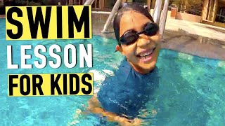 How to teach swimming to your children in your swim pool