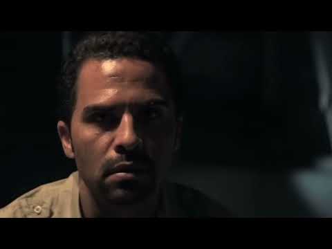 La Soga (2010 US release) trailer: Washington Heights alleys cross-cut with Santiago, police raids, and street processions