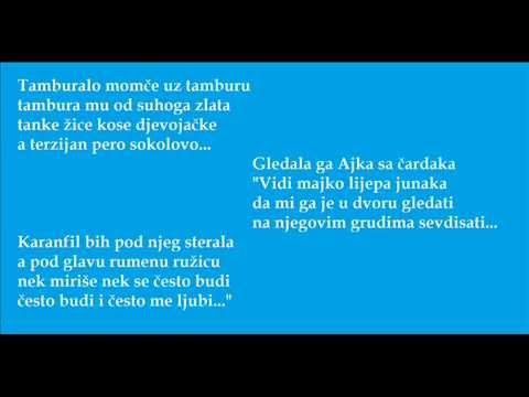 Tamburalo momče uz tamburu