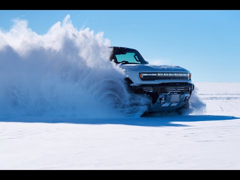 Hummer EV Run of Ascent Drive Resort in the snow.
