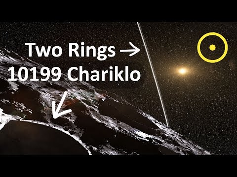 First Asteroid with a Ring System
