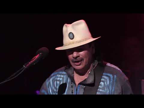 Videoclip de Love Makes the World Go Round — Santana