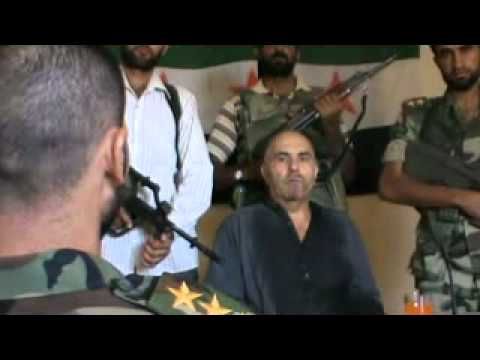 مقابلة قائد لواء أحفاد محمد مع الطيار الأسير مفيد سليمان في موحسن في محافظة دير الزور