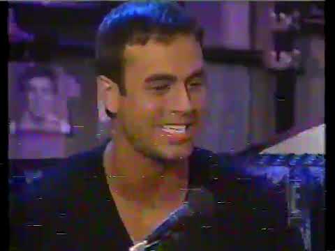 Tony Bruno accompanying Enrique Iglesias proofing that he can sing on Howard Stern
