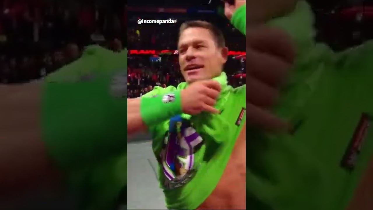 John Cena Says  There is a young man over here who's wearing a wrong color hat and shirt 